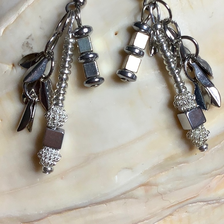 Multidimensional Silver Dangle Earrings.